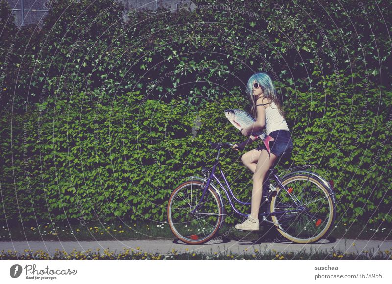 fish, bicycle and a young Fish Bicycle ride a bike Youth (Young adults) teenager Crazy Whimsical bollocks wig incognito Strange girl Puberty Young woman