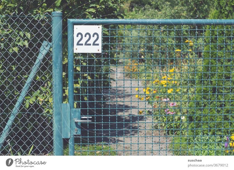 garden gate with the no. 222 Garden Garden door garden door Entrance Allotment garden association Fence Grating see through No. number Metal door Summery