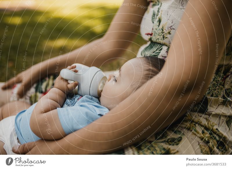 Baby with milk bottle Eating Food Feed Healthy Eating Milk Delicious Natural Babyhood Mother Motherhood Care Together Togetherness Family Bonding Baby formula