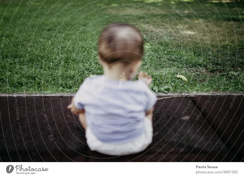 Rear view child playing on grass Child Baby Grass Summer Green Toddler Nature Small Cute Park Happiness Exterior shot Joy Infancy Boy (child) Playing cheerful