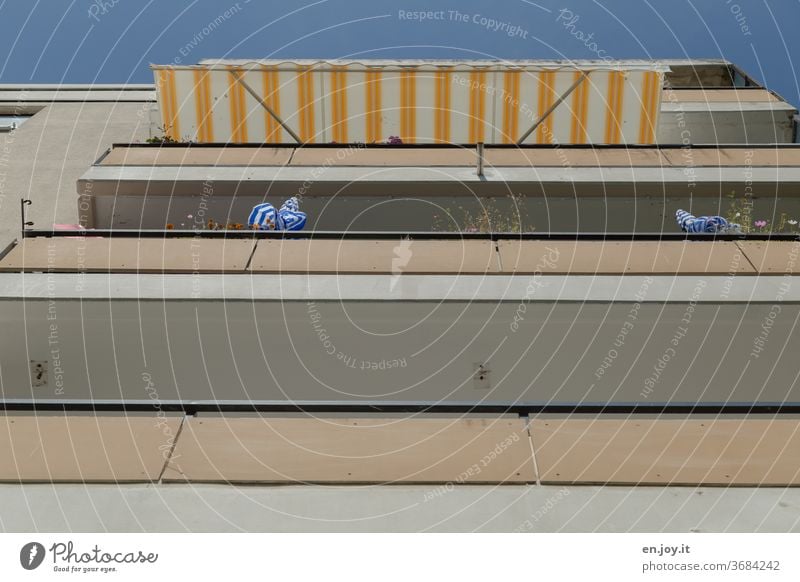 Vacation on the balcony House (Residential Structure) High-rise Balconies Sun blind Apartment house dwell sun protection Stripe Worm's-eye view Tall Balcony