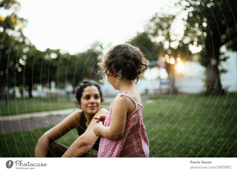 Daughter looking to Mother Together togetherness motherhood Mother with child Family & Relations Lifestyle Playground Park Summer Summer vacation Beautiful