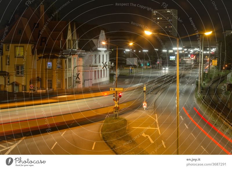 PUBLIC TRANSPORT Public transit Tram lines Town City Night Street lighting Lantern Light Artificial light cross Crossroads Transport Road traffic