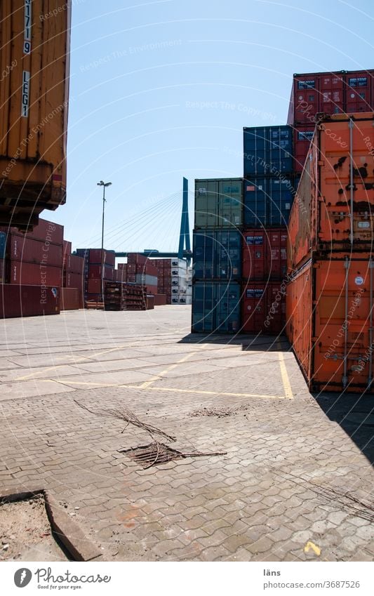 Container in port Harbour Logistics Container terminal deal Economy Hamburg Deserted Port City Kohlbrand bridge Colour photo Exterior shot Copy Space bottom