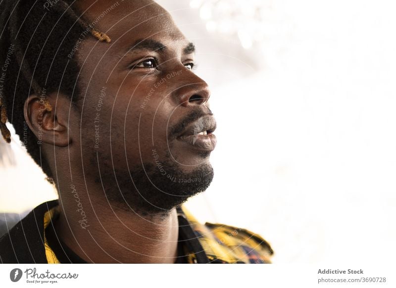 Portrait of an attractive young black man person portrait male african guy american handsome looking lifestyles confident model confidence expression afro cool