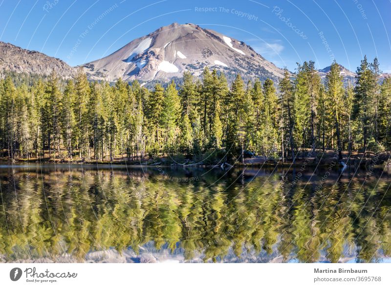 Mirror Lake in the Lassen Volcanic National Park, California USA volcanic lake snow water peak lassen nature park national reflection sky volcano california