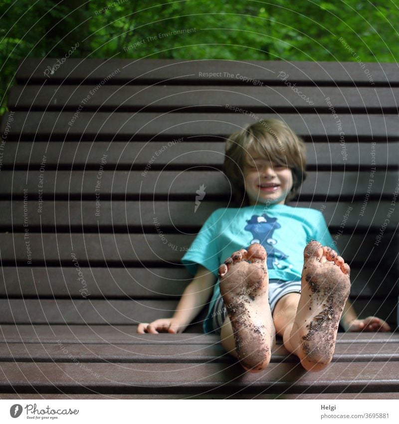 dirty feet - boy sitting on a bench with dirty feet | favourite person Child Boy (child) soles frowzy Dirty Woodground Barefoot Joy fun Bench Laughter Close-up