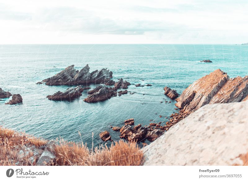 Landscape of a rocky cliff to the sea landscape seascape copy space loiba galicia cliffs rocks ocean atlantic tourism spain horizon clean emerging spiky coast