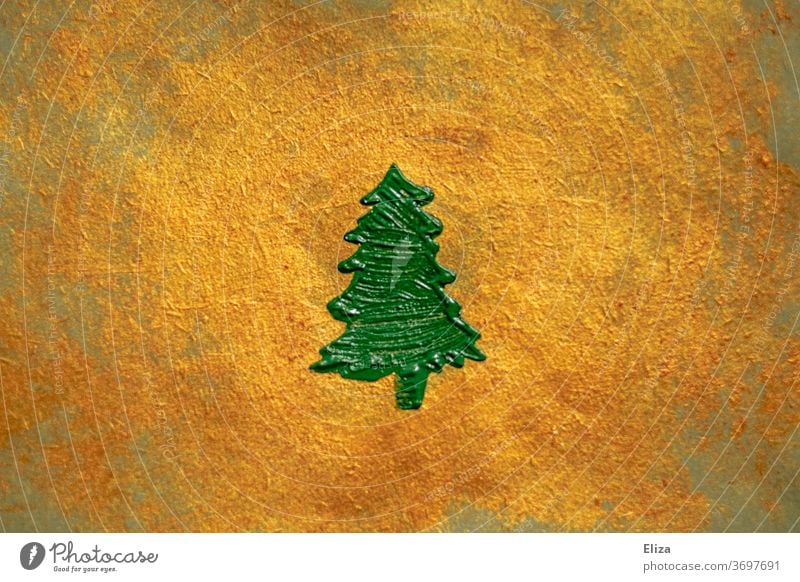 green painted fir tree on a gold shimmering background. Christmas. Fir tree Gold Green golden christmas tree Noble Decoration texture Christmas & Advent Tree