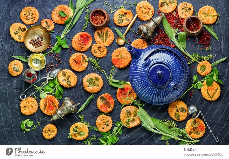 Cookies with herbs. cookie food pastries shortbread salty cookies spicy herbs sage thyme herb cookies homemade crunchy rosemary kettle teapot teakettle herbal