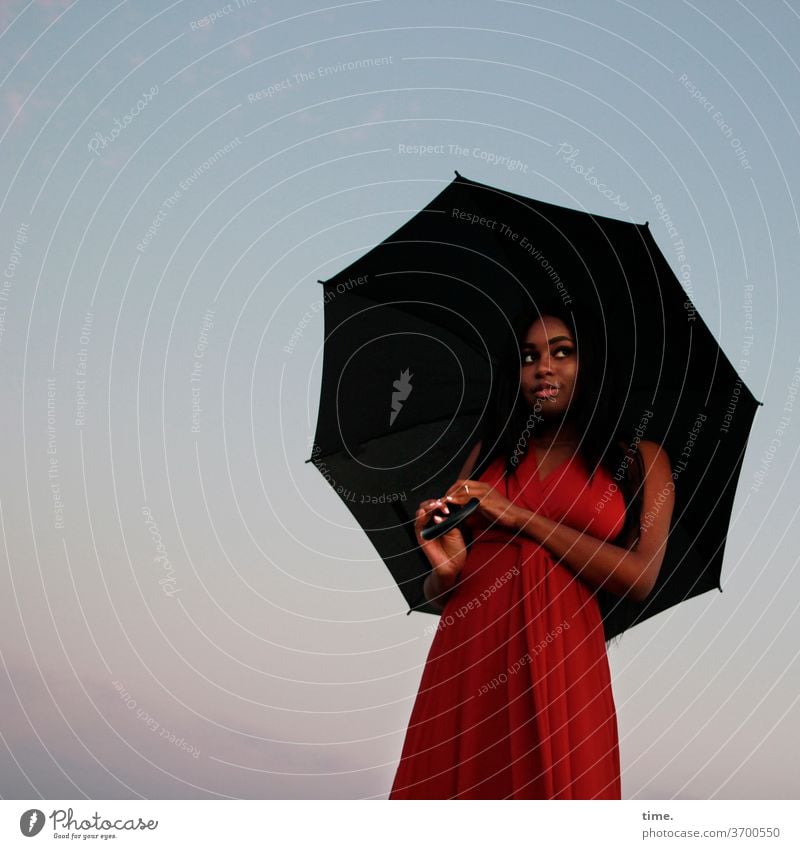 arabella Woman stop Observe feminine Umbrellas & Shades Wait Elegant Skeptical Red North Sea Sky Beach Dress Long-haired Dark-haired Moody Evening Looking look