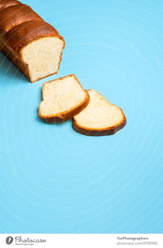 Sourdough sandwich bread on a blue table. Homemade Hokkaido milk bread baked bakery baking blue background brioche butter copy space crust cuisine cut out eat