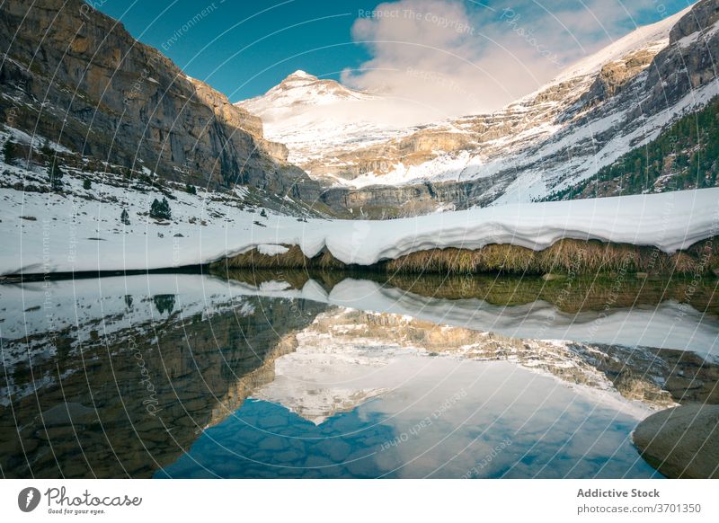 Winter mountainous terrain with river winter valley snow nature landscape picturesque vivid rock season travel ridge rocky scenic range environment color peak