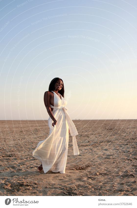 arabella Woman Beach Sky Sand Dress Long-haired Dark-haired Elegant Laughter cheerful Evening Moody Barefoot Horizon Free Freedom on one's own Ease liveliness