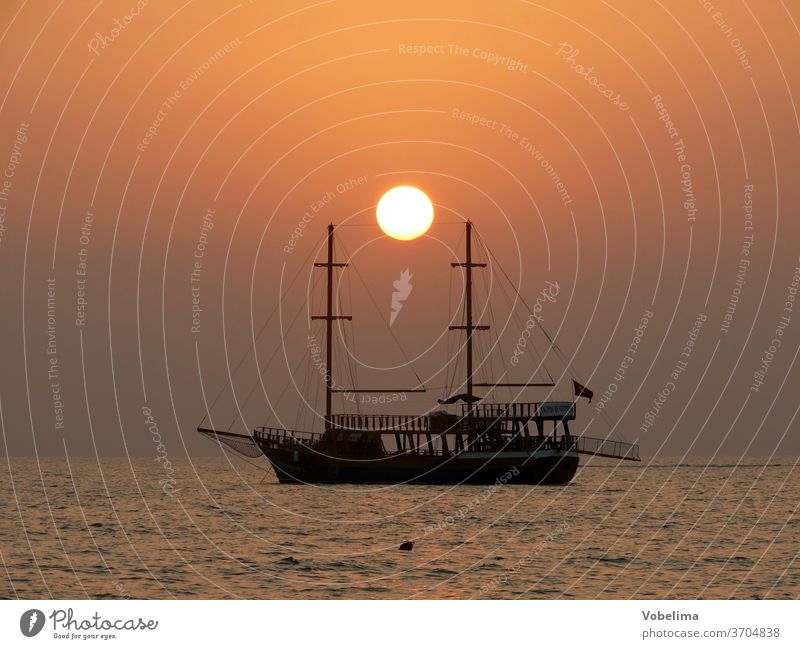 Ship at sunset ship Sailing ship side turkey Turkish Riviera Sunset Evening evening mood evening sky Ocean Beach Mediterranean sea romantic Romance Water Sky