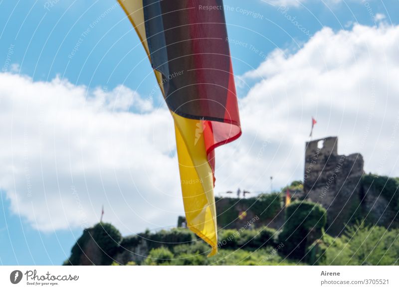 possessive Flag Blow Above castle German Flag flag Castle ruin Ruin Flying the flag Clouds Beautiful weather Shallow depth of field black red gold river cruise