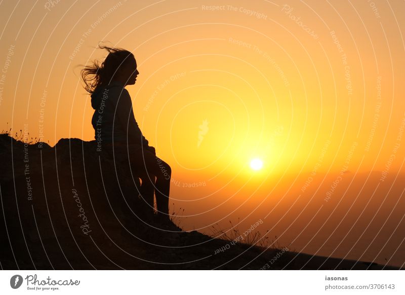 Teenage girl watching sunset Sunset sunset mood Sunset sky Teenage Girls Vacation mood Evening sun evening mood evening sky Silhouette Wind Dusk on one's own