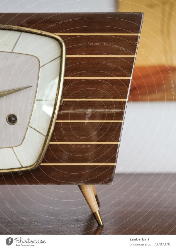 Table clock from the 50s with varnish and brass Clock mid-century obliquely Brass Varnish polish wood Stripe Brown vintage Detail pointer Clock face Nostalgia