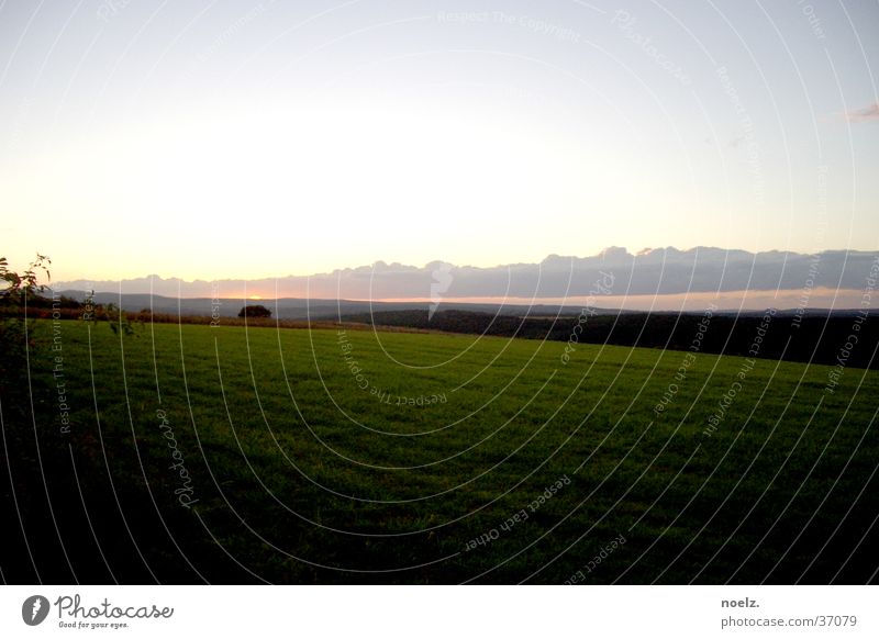 SUNSET MEADOW. Sunset Meadow Clouds Horizon Green Mountain Sky green meadow