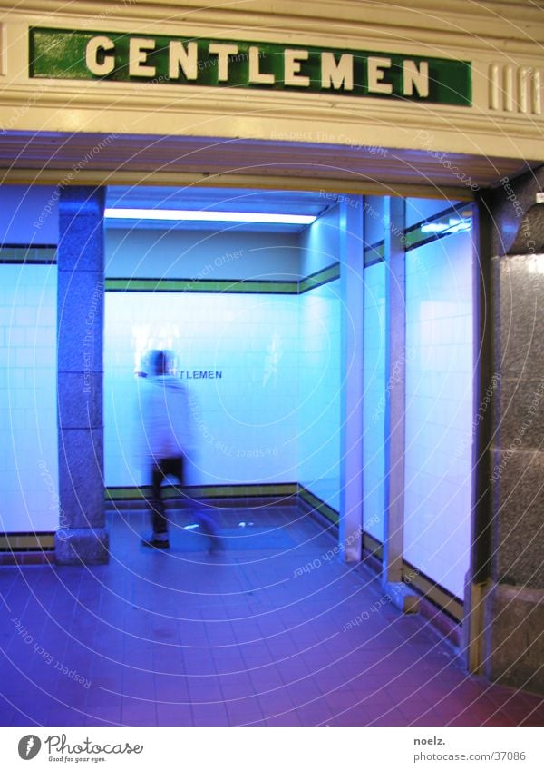 MAN'S TOILET, BLUE. Public restroom Gentleman Gentlemen's toilet Man Blur Motion blur Transport blue light