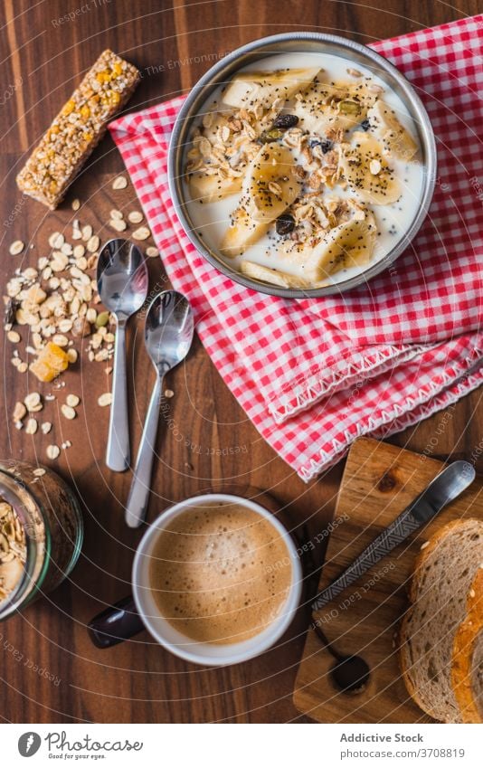 Delicious homemade healthy breakfast bowl yogurt banana oat cereal fruit food eat fresh kitchen morning meal nutrition diet organic delicious ingredient tasty