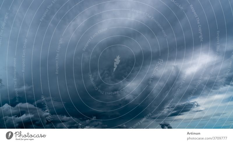 Dark dramatic sky and clouds. Background for death and sad concept. Gray sky and fluffy white clouds. Thunder and storm sky. Sad and moody sky. Nature background. Dead abstract background. Cloudscape.