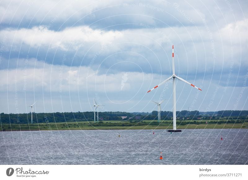 Wind energy, wind turbines on land and on water Wind energy plant Renewable energy wind power Pinwheel Energy industry Environmental protection Climate change