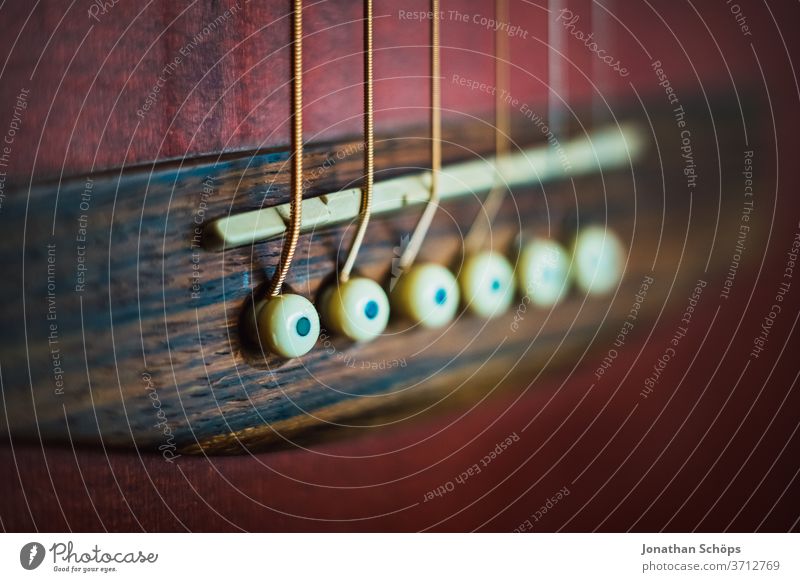 Macro guitar strings of a guitar detail Guitar Interior shot Learn to play Playing the instrument macro Music Musical instrument Music tuition Close-up