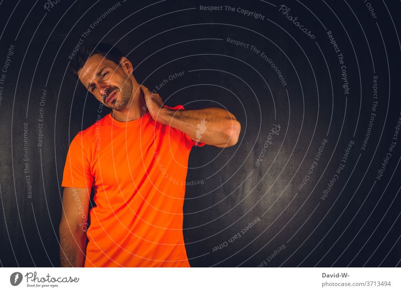 Man has neck pain Pain Human being Dislocated Neck Nape distorted with pain Facial expression Sports injury violation