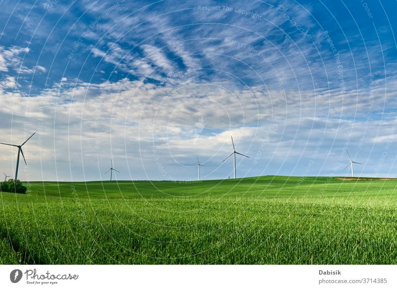 Wind turbine in the field. Wind power energy concept wind generator industry electricity alternative landscape green clean nature renewable environment