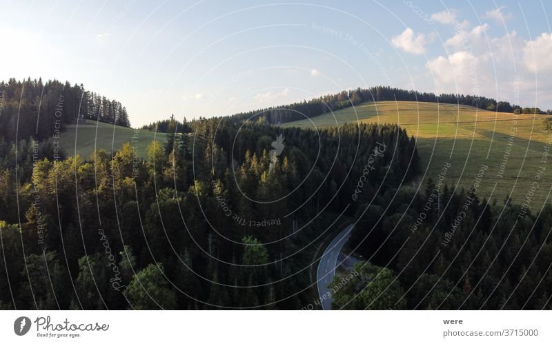 Panorama at sunset from the mountains of the Black Forest near Gersbach over the Wehratal and the city of Wehr towards the Swiss Alps Europe Germany alps