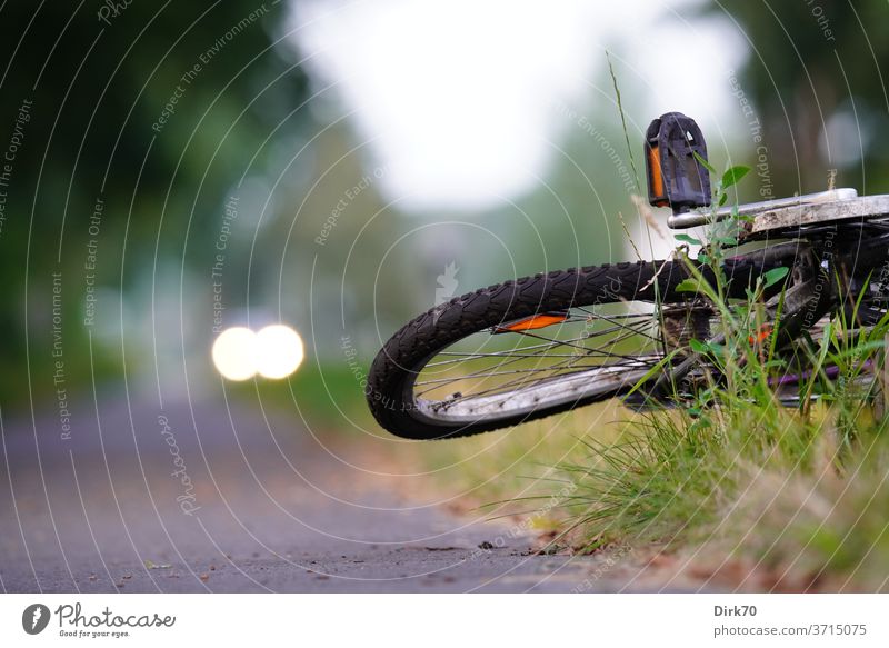 Road safety - bent bicycle at the roadside Safety Transport Road traffic Traffic infrastructure Accident Street Bicycle Wheel Broken warped Skewed cycle path