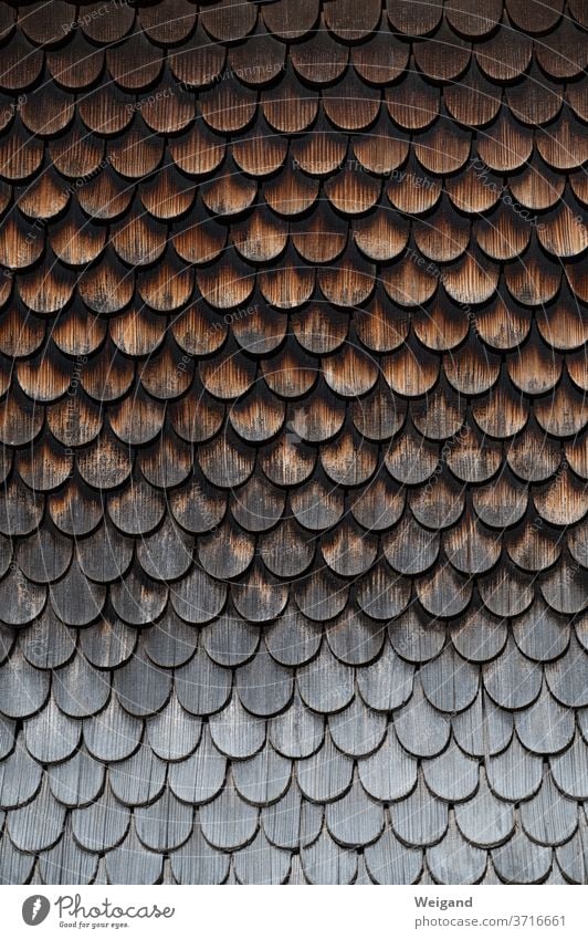 Wooden shingles on old farmhouse House (Residential Structure) wood Facade Weather Brown Weathered Gray allgau Rain Skin Flake wooden shingles