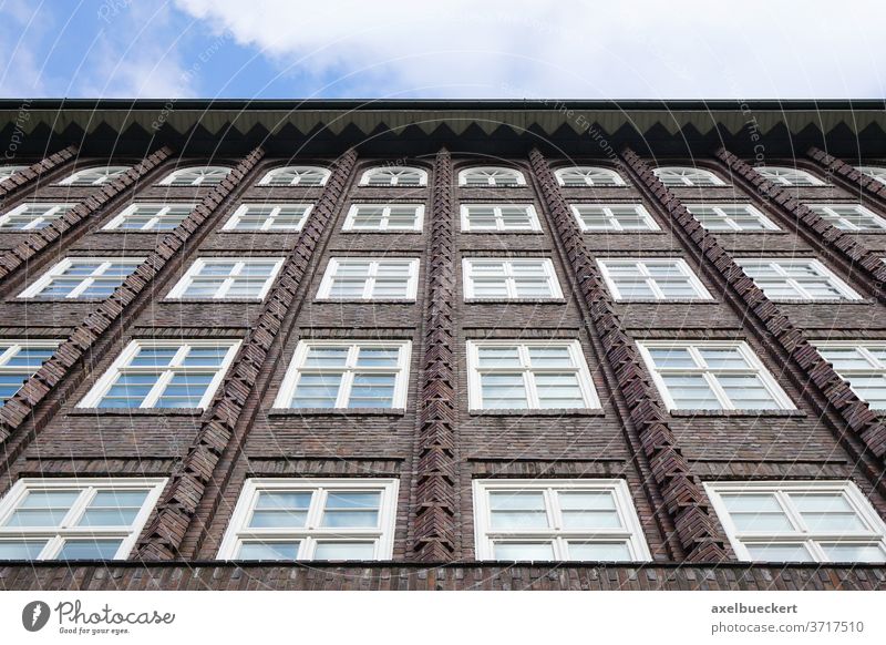 brick building facade with endless rows of windows architecture house Hamburg Hanseatic exterior traditional high rise highrise multistory skyscraper urban