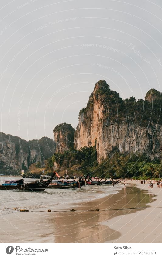 Railay Beach Sunset golden hour long tail boats thailand railay