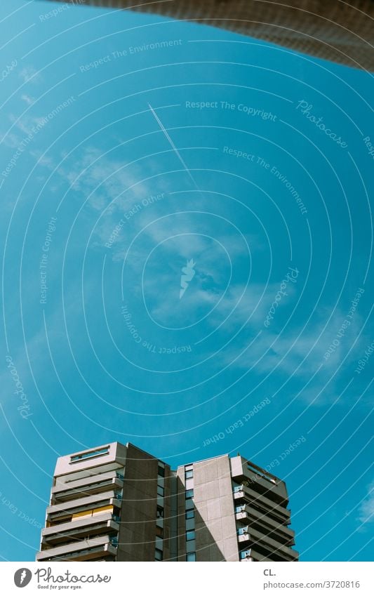 skyscraper High-rise High-rise facade Sky Worm's-eye view Blue sky Large Facade Cloudless sky Building Architecture Town Deserted Exterior shot