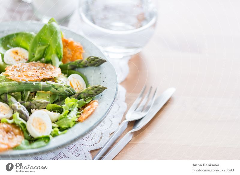 Asparagus Salad with quails eggs and cheese crisps asparagus salad quail egg healthy avocado detox gruyere green food vegetable gourmet vegetarian appetizer