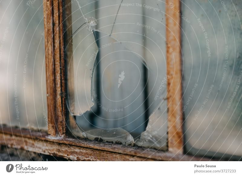 Broken window Window windows Damage Damaged Weathered Glass Vandalism Abandoned abandoned building abandoned house Derelict empty Colour photo damage