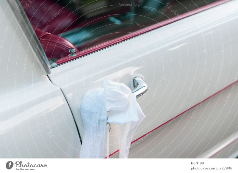 Bridal veil on the door handle of a white Mustang with red interior car door handle Mustang, Red Leather seat get married Car Vintage car luck Future wish