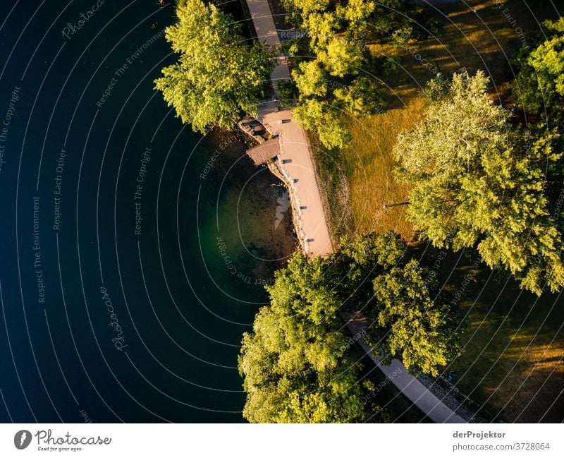 Footbridge with lake in Lower Saxony Bird's-eye view Sunlight Reflection Contrast Copy Space middle Copy Space right Copy Space left Copy Space bottom