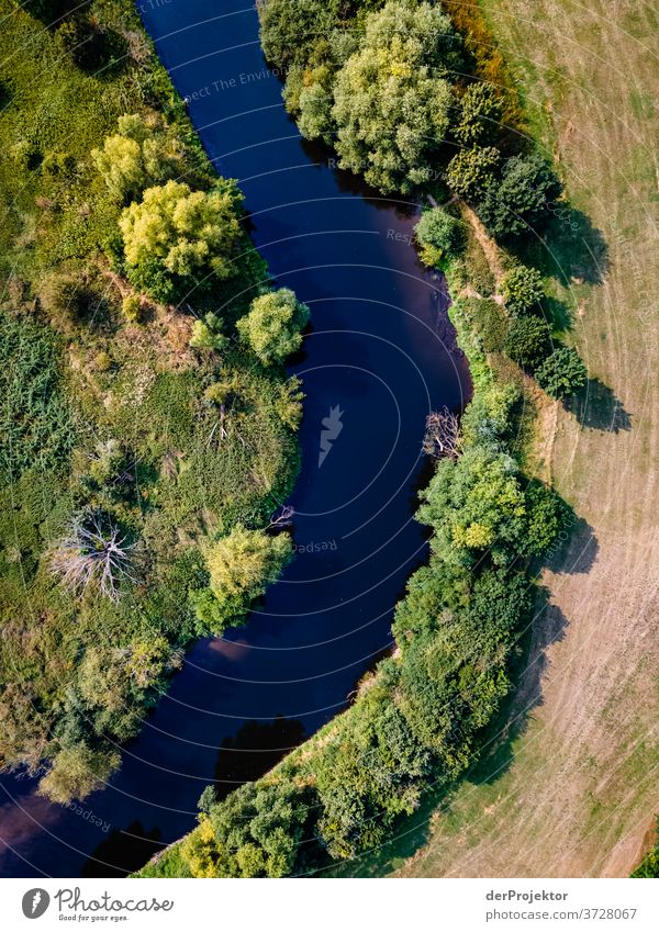 The river the Leine in Lower Saxony Bird's-eye view Sunlight Reflection Contrast Copy Space middle Copy Space right Copy Space left Copy Space bottom