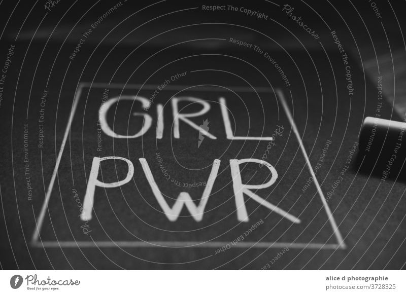 girl power written in white on a black piece of paper Woman Day Strong Freedom Emancipation force fight discrimination feminist Tolerant Force