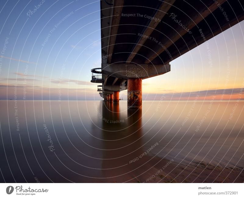 pier II Landscape Water Sky Clouds Horizon Sun Sunrise Sunset Weather Beautiful weather Coast Ocean Deserted Blue Brown Violet Sea bridge Colour photo