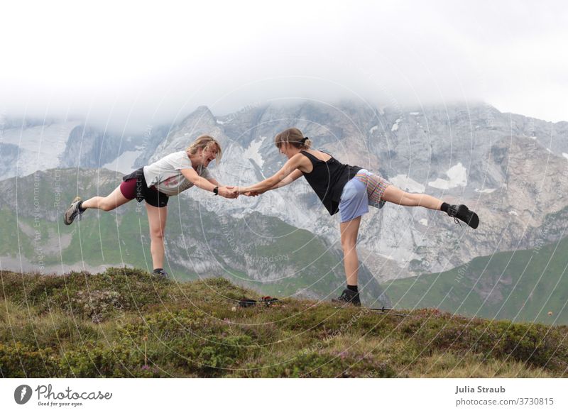 Yoga on the mountain just before a thunderstorm Mountain Mountain ridge Austria Above aviator women in common Hiking experience Adventure Peak wander Alps