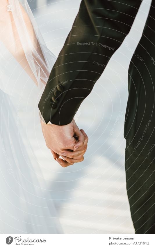 bride and groom, newlyweds, holding hands, wedding day, wedding picture, Wedding Newlywed couple holding hands love understanding