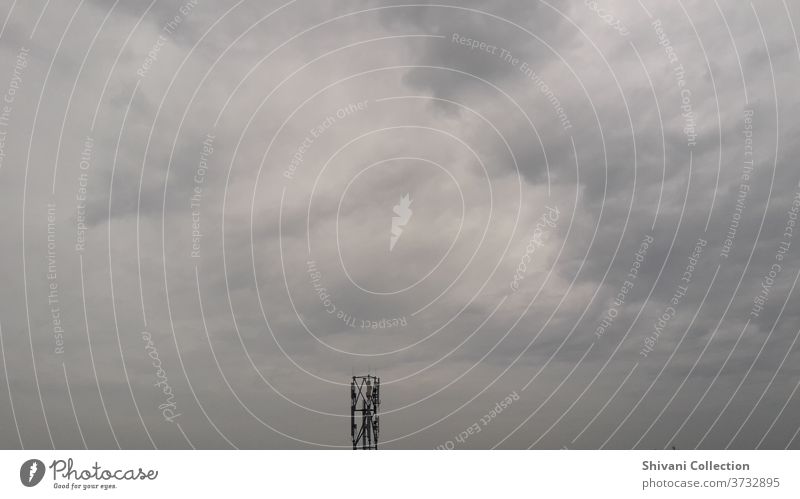 Telecommunication tower with stormy clouds sky background. Copy space nature and  environment & technology concepts. Antenna Beautiful scenery broadcast