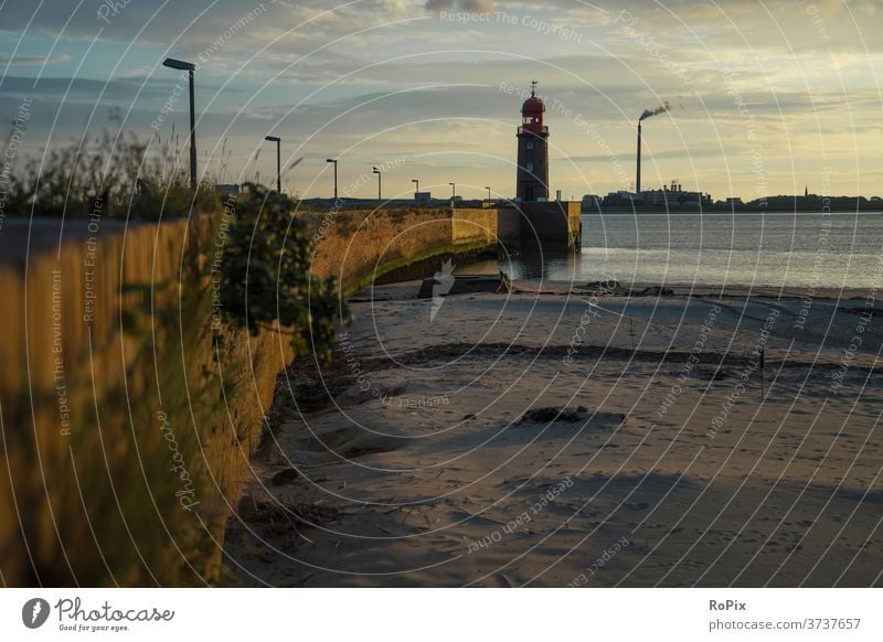 Sunset at the old pier in Bremerhaven. Harbour harbour boats Fisherman fishing Beach beach Coast Ocean sea ocean Tide tides Summer Summer vacation coast mare