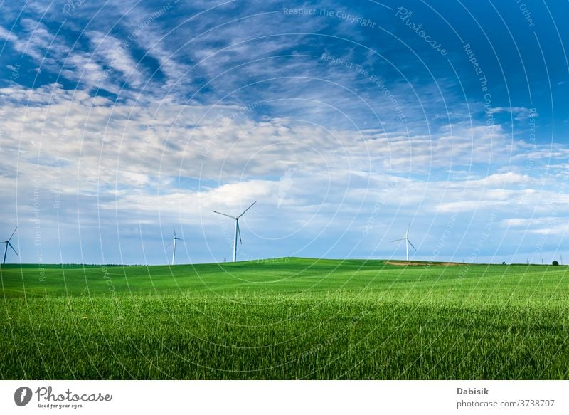 Wind turbine in the field. Wind power energy concept wind generator industry electricity alternative landscape green clean nature renewable environment