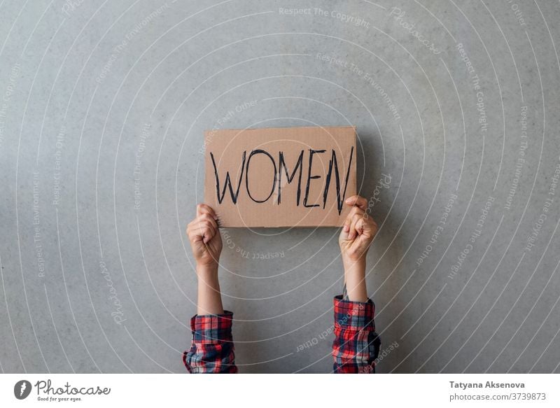 Woman activist hands with poster women rights banner demonstration protest people politics human gender street community equality female protester sign