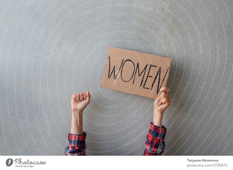 Woman activist hands with poster women rights banner demonstration protest people politics human gender street community equality female protester sign